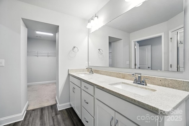 334 Ladybird Ln, Pineville, NC 28134 - full bath featuring double vanity, wood finished floors, and a spacious closet