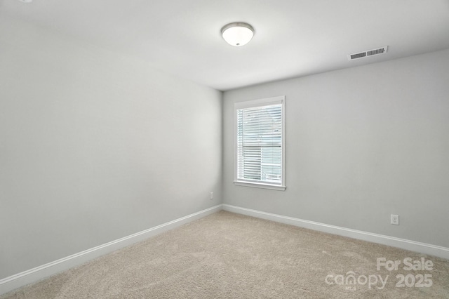 334 Ladybird Ln, Pineville, NC 28134 - spare room with baseboards and light colored carpet