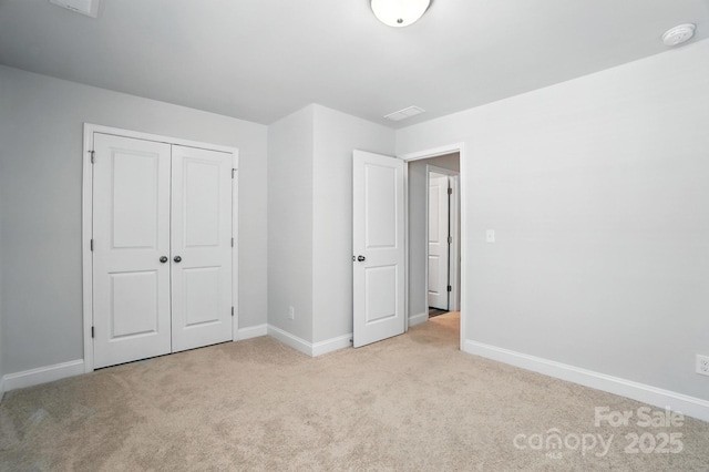 334 Ladybird Ln, Pineville, NC 28134 - unfurnished bedroom with light colored carpet and a closet