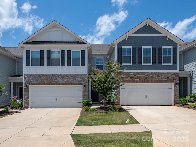 4177 Steel Way, Sherrills Ford, NC 28673 - craftsman house with concrete driveway, an attached garage, board and batten siding, and stone siding