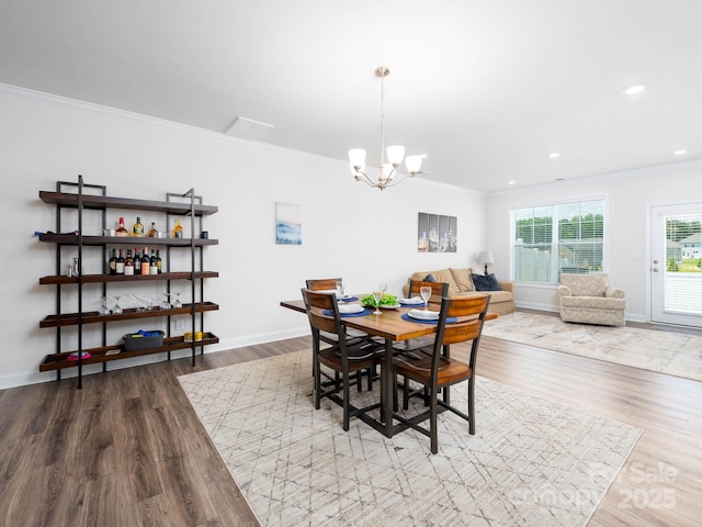 4177 Steel Way, Sherrills Ford, NC 28673 - dining space with ornamental molding, a chandelier, wood finished floors, and recessed lighting