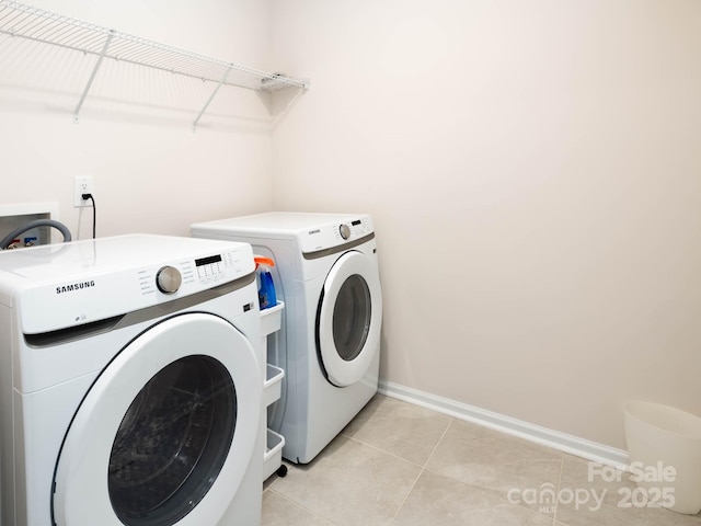 4177 Steel Way, Sherrills Ford, NC 28673 - laundry area featuring washing machine and dryer and light tile patterned flooring