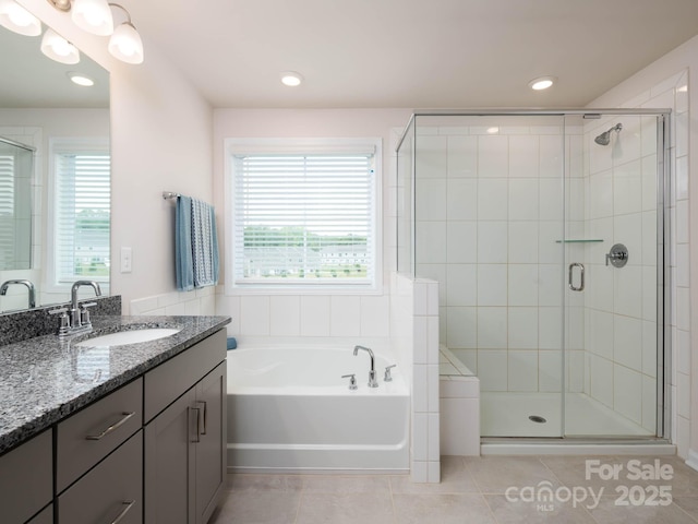 4177 Steel Way, Sherrills Ford, NC 28673 - full bath featuring vanity, a garden tub, a stall shower, tile patterned flooring, and recessed lighting