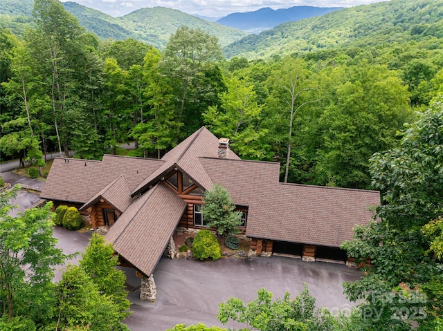 303 Flying Hawk Trl, Waynesville, NC 28786 - aerial view of property and surrounding area with a mountain backdrop and a heavily wooded area