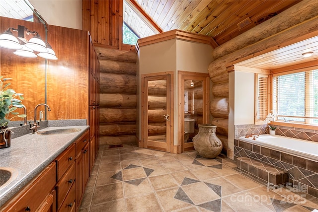 303 Flying Hawk Trl, Waynesville, NC 28786 - full bathroom with rustic walls, plenty of natural light, a garden tub, wooden ceiling, and double vanity