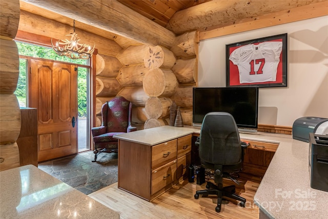 303 Flying Hawk Trl, Waynesville, NC 28786 - office area featuring log walls, a chandelier, wooden ceiling, lofted ceiling, and wood finished floors