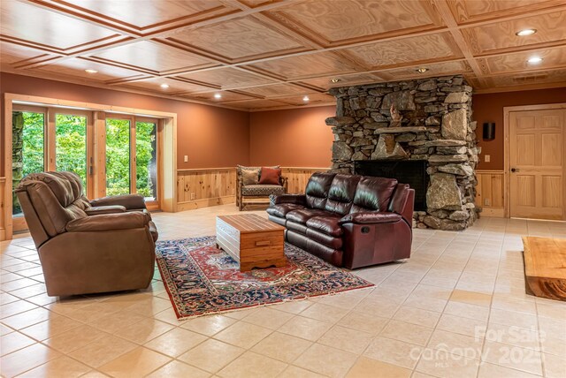 303 Flying Hawk Trl, Waynesville, NC 28786 - living area with wainscoting, tile patterned floors, recessed lighting, and a fireplace