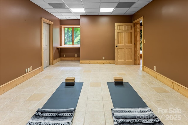 303 Flying Hawk Trl, Waynesville, NC 28786 - exercise area featuring a paneled ceiling and tile patterned flooring