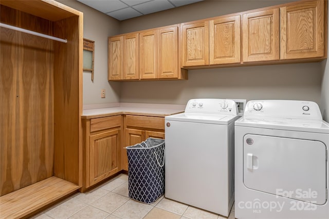 303 Flying Hawk Trl, Waynesville, NC 28786 - washroom with cabinet space, independent washer and dryer, and light tile patterned flooring