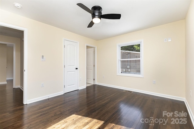 803 Irene Ave, Kannapolis, NC 28083 - unfurnished bedroom with dark wood-style floors and ceiling fan