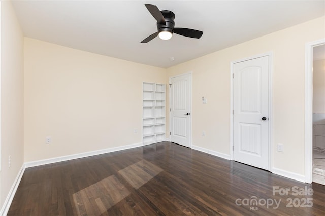 803 Irene Ave, Kannapolis, NC 28083 - unfurnished bedroom featuring dark wood-style floors and a ceiling fan