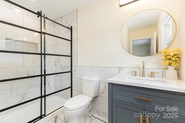 803 Irene Ave, Kannapolis, NC 28083 - full bath featuring marble look tiles, tile walls, vanity, and a tile shower