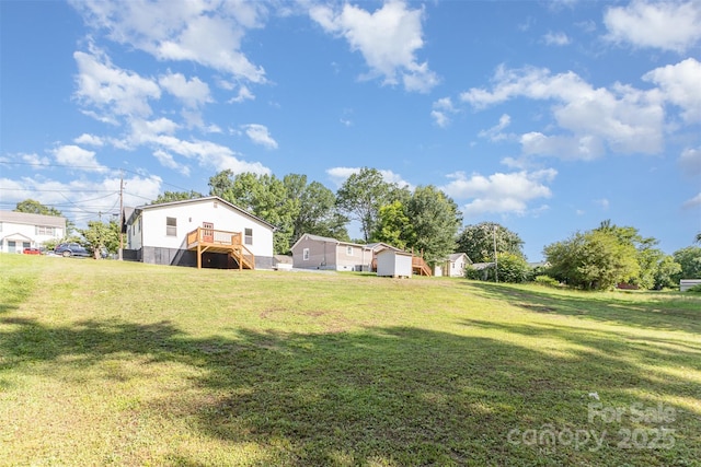 803 Irene Ave, Kannapolis, NC 28083 - view of green lawn featuring stairs and a deck