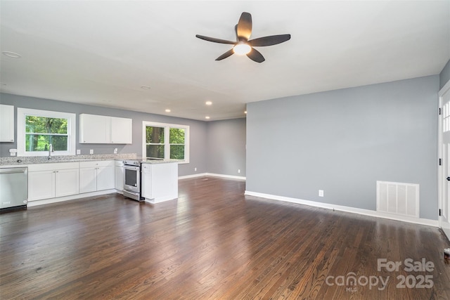 159 Potato House Rd, Lawndale, NC 28090 - unfurnished living room featuring ceiling fan, dark wood-style floors, healthy amount of natural light, and recessed lighting