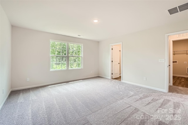 136 Dorian Pl, Troutman, NC 28166 - spare room featuring carpet and recessed lighting