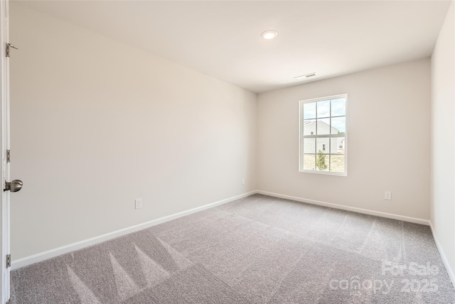 136 Dorian Pl, Troutman, NC 28166 - spare room with carpet floors and recessed lighting