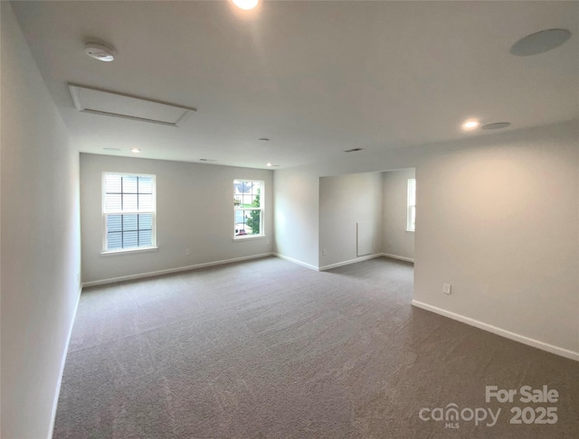 2382 Drake Mill Ln SW, Concord, NC 28025 - carpeted empty room featuring attic access, a smoke detector, and recessed lighting