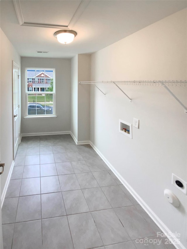 2382 Drake Mill Ln SW, Concord, NC 28025 - washroom with hookup for an electric dryer, washer hookup, and light tile patterned flooring