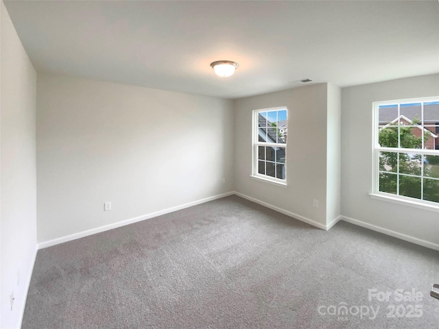 2382 Drake Mill Ln SW, Concord, NC 28025 - carpeted empty room featuring healthy amount of natural light