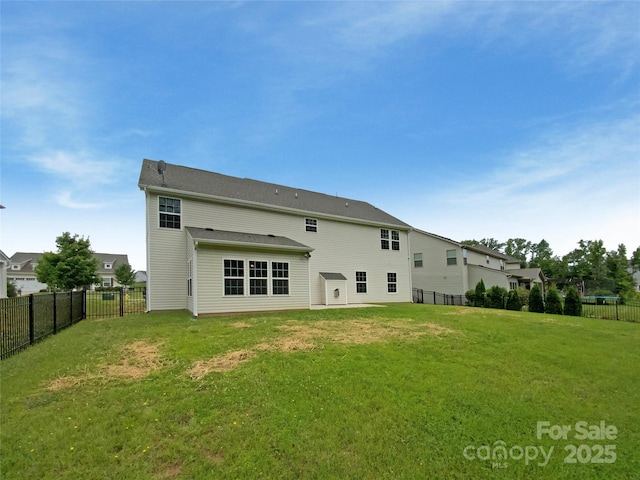 2382 Drake Mill Ln SW, Concord, NC 28025 - rear view of house featuring a fenced backyard