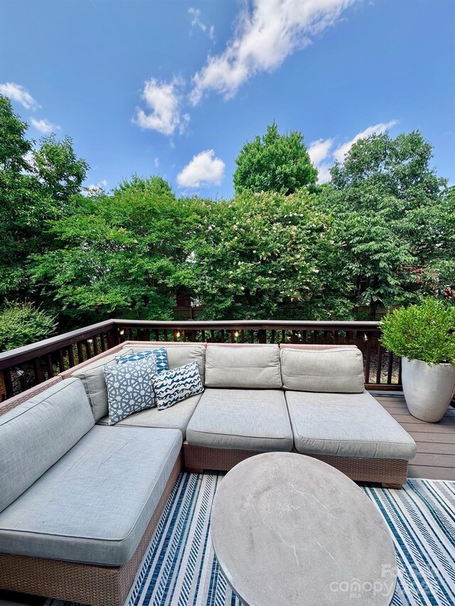 3036 Luke Crossing Dr, Charlotte, NC 28226 - wooden deck with an outdoor living space