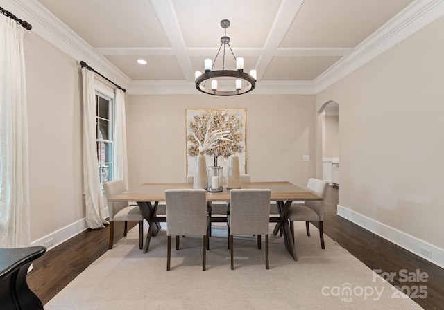 408 Covington Xing, Matthews, NC 28104 - dining space with arched walkways, a chandelier, wood finished floors, coffered ceiling, and beamed ceiling