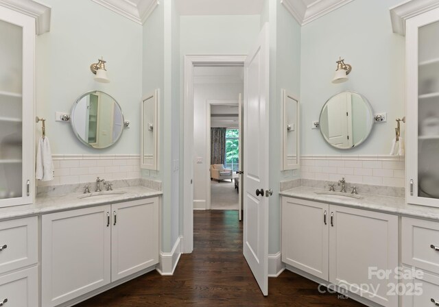 408 Covington Xing, Matthews, NC 28104 - full bath with ornamental molding, two vanities, backsplash, and wood finished floors