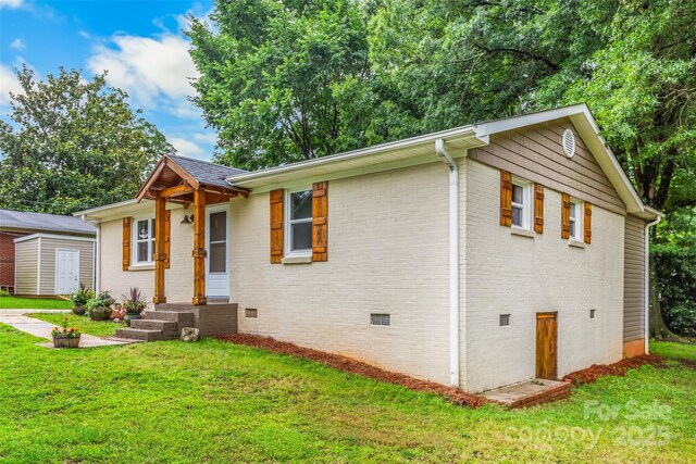 21322 Mccall St, Cornelius, NC 28031 - single story home with crawl space, brick siding, and a front yard