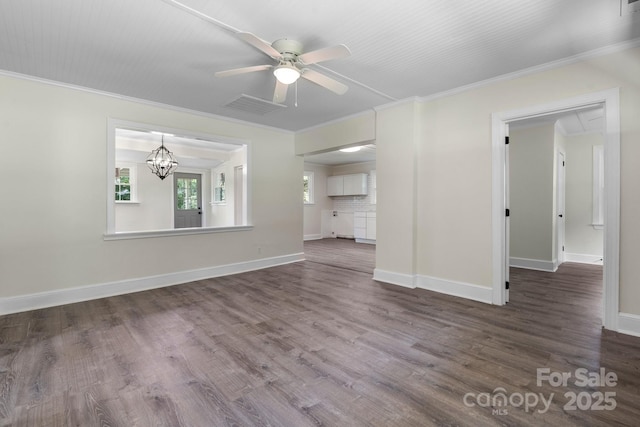 921 Spencer Rd NE, Conover, NC 28613 - unfurnished living room with crown molding, a ceiling fan, wood finished floors, and a chandelier