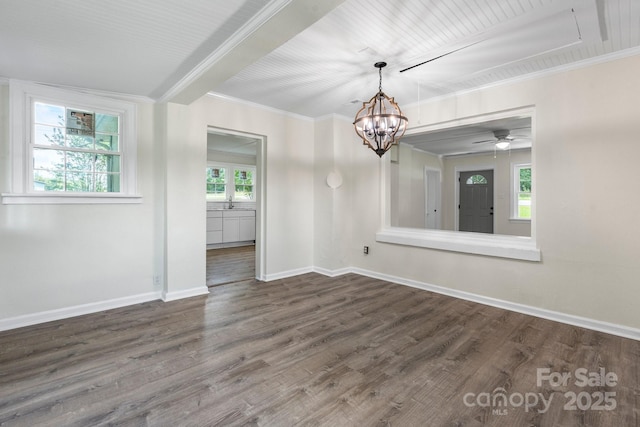 921 Spencer Rd NE, Conover, NC 28613 - unfurnished dining area with wood finished floors, ornamental molding, a chandelier, and ceiling fan