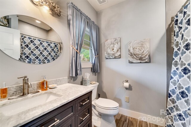 396 River Club Dr, Cullowhee, NC 28723 - full bathroom featuring vanity, wood finished floors, and a shower with shower curtain