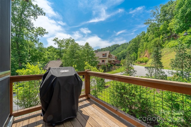 396 River Club Dr, Cullowhee, NC 28723 - deck with a grill and a forest view