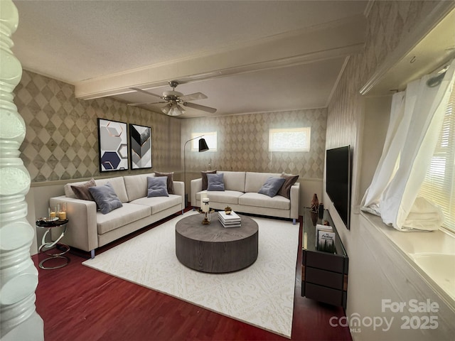 1107 Crestfield Dr, Lancaster, SC 29720 - living room featuring wallpapered walls, wood finished floors, beamed ceiling, and a ceiling fan