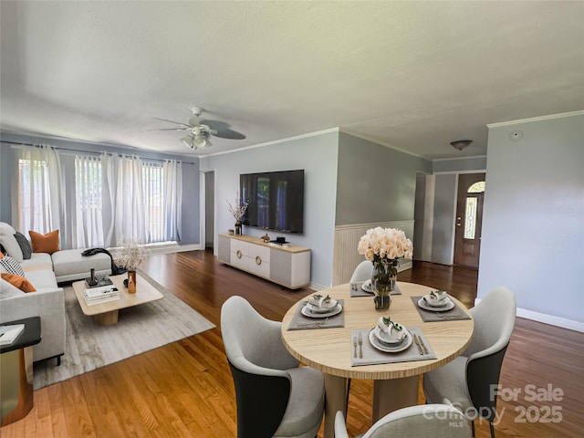 1107 Crestfield Dr, Lancaster, SC 29720 - dining room featuring a ceiling fan, crown molding, wood finished floors, and a textured ceiling