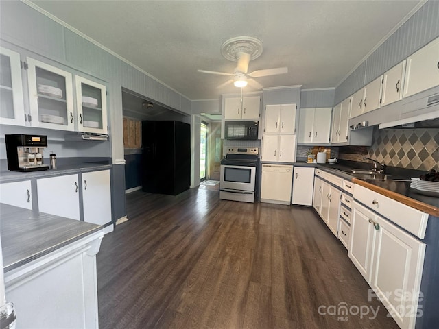 1107 Crestfield Dr, Lancaster, SC 29720 - kitchen featuring stainless steel range with electric cooktop, black microwave, white dishwasher, crown molding, and dark countertops