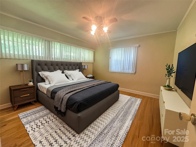 1107 Crestfield Dr, Lancaster, SC 29720 - bedroom featuring crown molding, wood finished floors, and a ceiling fan