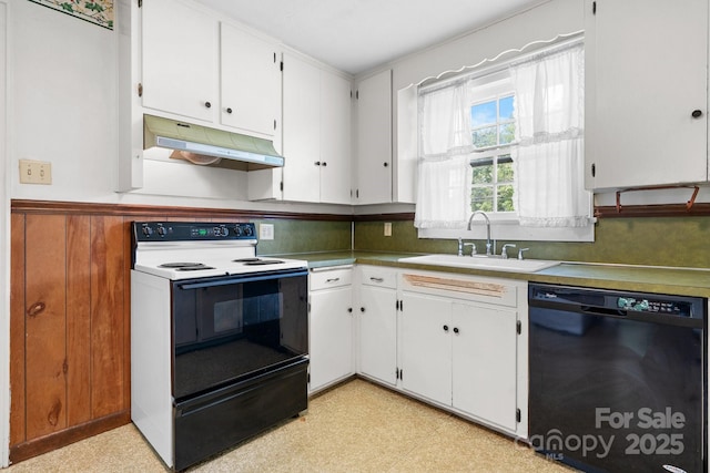 1520 21st Ave NE, Hickory, NC 28601 - kitchen featuring black appliances, under cabinet range hood, light flooring, white cabinets, and wainscoting