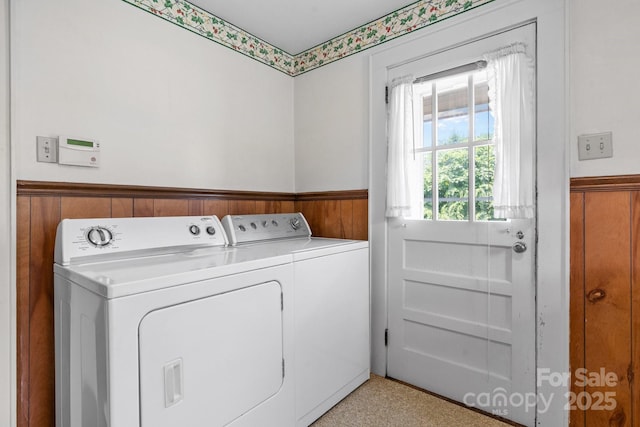 1520 21st Ave NE, Hickory, NC 28601 - laundry room with wainscoting, washer and clothes dryer, and wood walls