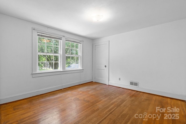 1520 21st Ave NE, Hickory, NC 28601 - unfurnished room with wood finished floors