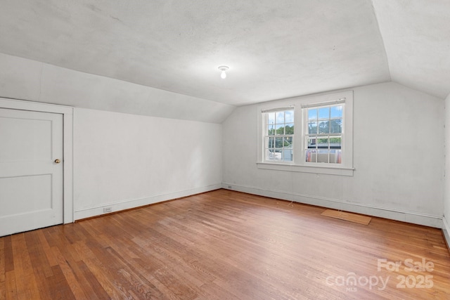 1520 21st Ave NE, Hickory, NC 28601 - additional living space with wood finished floors and vaulted ceiling