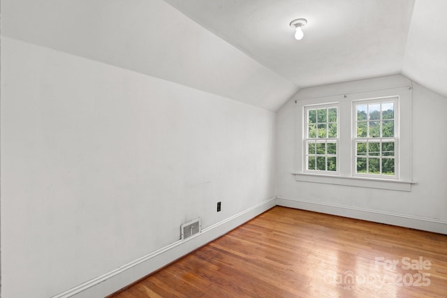 1520 21st Ave NE, Hickory, NC 28601 - additional living space with vaulted ceiling and light wood-style flooring