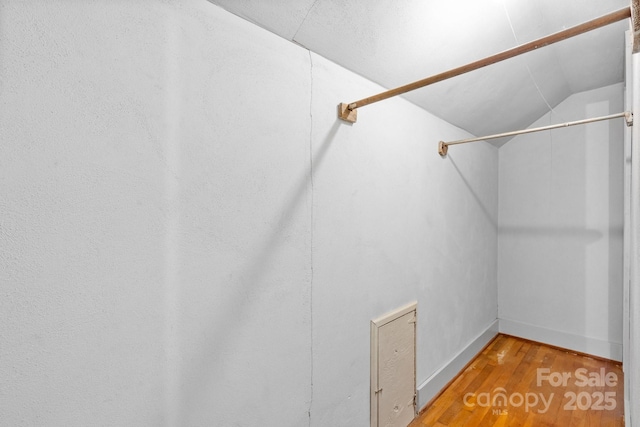 1520 21st Ave NE, Hickory, NC 28601 - spacious closet featuring wood finished floors and vaulted ceiling