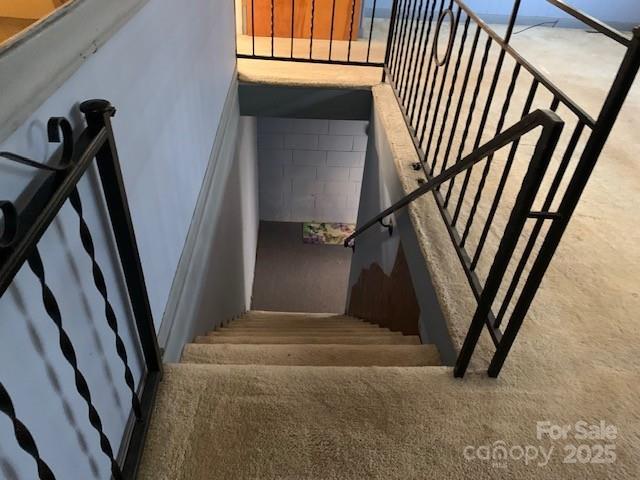 209 8th Ave NW, Hickory, NC 28601 - stairway with carpet floors