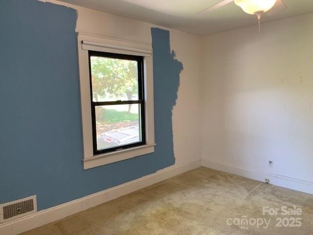 209 8th Ave NW, Hickory, NC 28601 - carpeted empty room featuring ceiling fan and baseboards