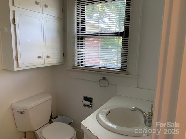 209 8th Ave NW, Hickory, NC 28601 - bathroom with toilet and vanity