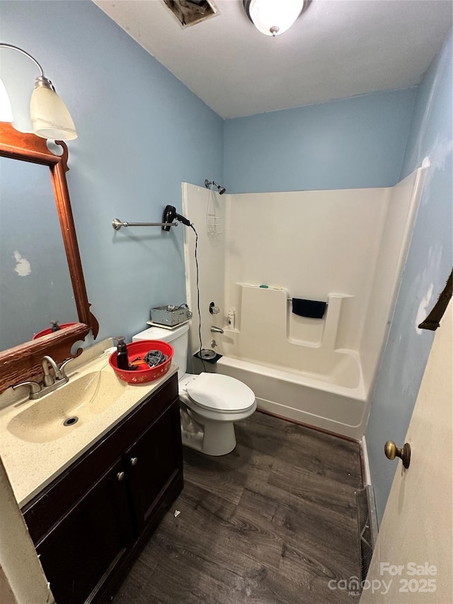 3396 Farm Lake Dr SW, Concord, NC 28027 - full bath featuring vanity, wood finished floors, and bathing tub / shower combination
