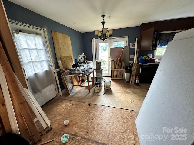 3396 Farm Lake Dr SW, Concord, NC 28027 - dining area featuring a chandelier and healthy amount of natural light
