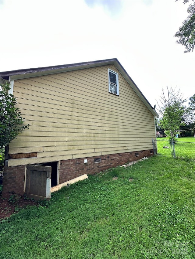 3396 Farm Lake Dr SW, Concord, NC 28027 - view of side of property with crawl space and a lawn