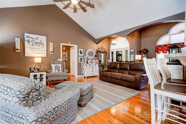 116 Camille Dr, Shelby, NC 28150 - living area featuring arched walkways, high vaulted ceiling, a ceiling fan, and wood finished floors