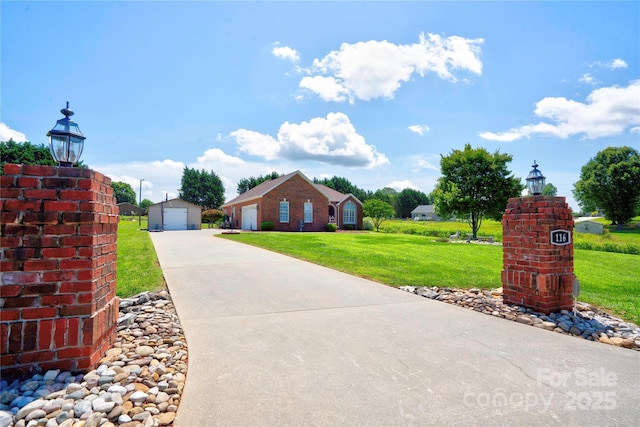 116 Camille Dr, Shelby, NC 28150 - view of front of home with a detached garage, a front lawn, and an outdoor structure